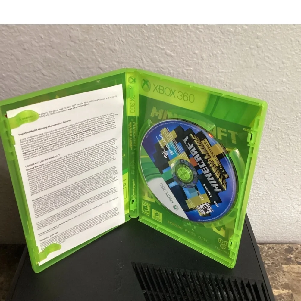 Microsoft Xbox 360 Game Console Bundle 4GB, Power Cord, Controller, and 2 games.